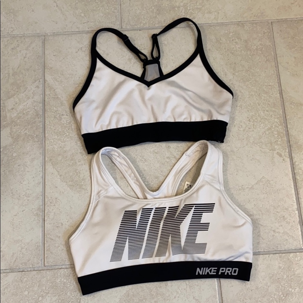 2 bras sports, 1 Nike pro and 1 pink